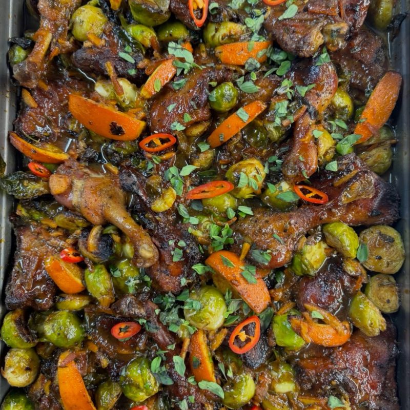 Braised duck with brussels sprouts, orange and chilli