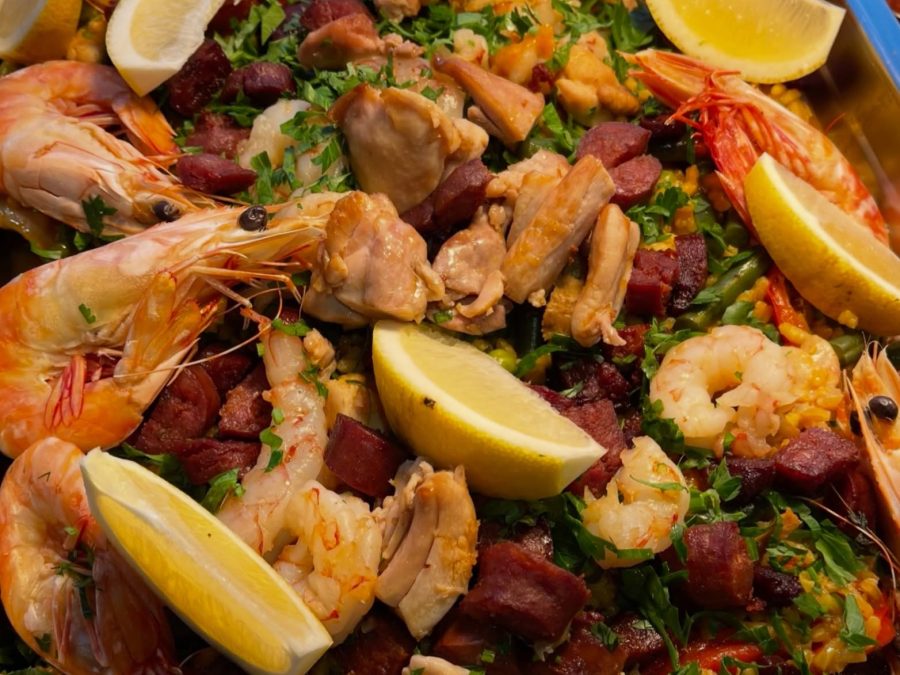 Paella with prawns, chicken and chorizo cooked in quantity for a crew lunch